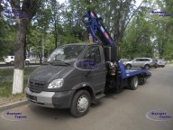 эвакуатор ГАЗ 33106 с ломаной платформой и КМУ